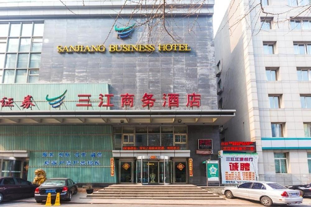 Dalian San Jiang Business Hotel Bagian luar foto